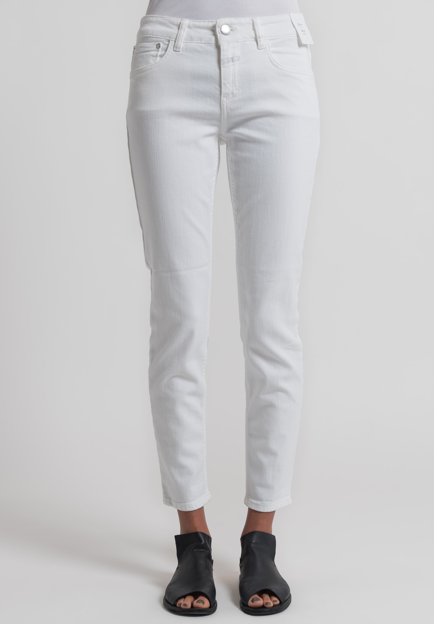 white narrow jeans