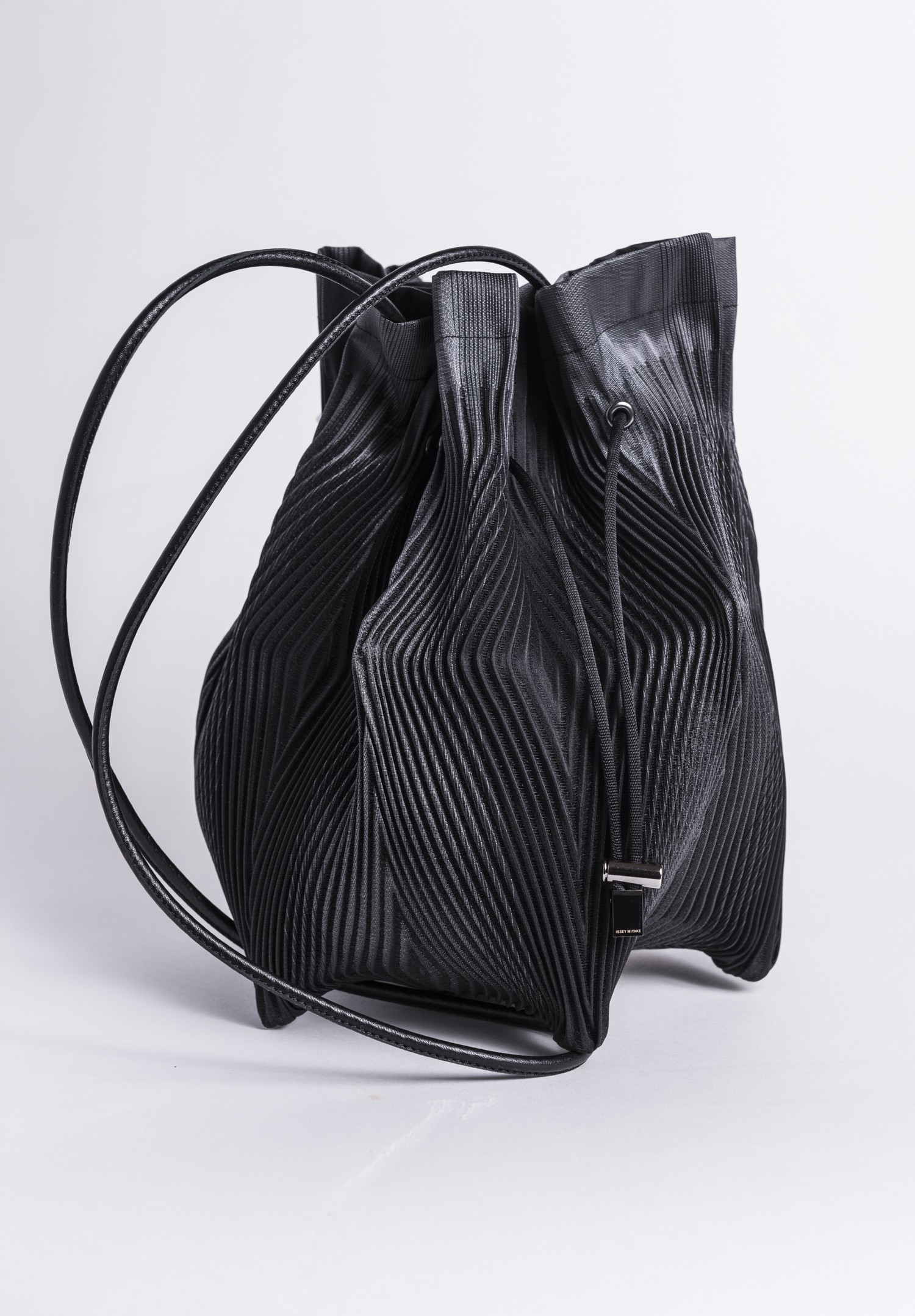 Issey Miyake Hexagonal Pleated Pouch Handbag in Dark Grey | Santa Fe ...