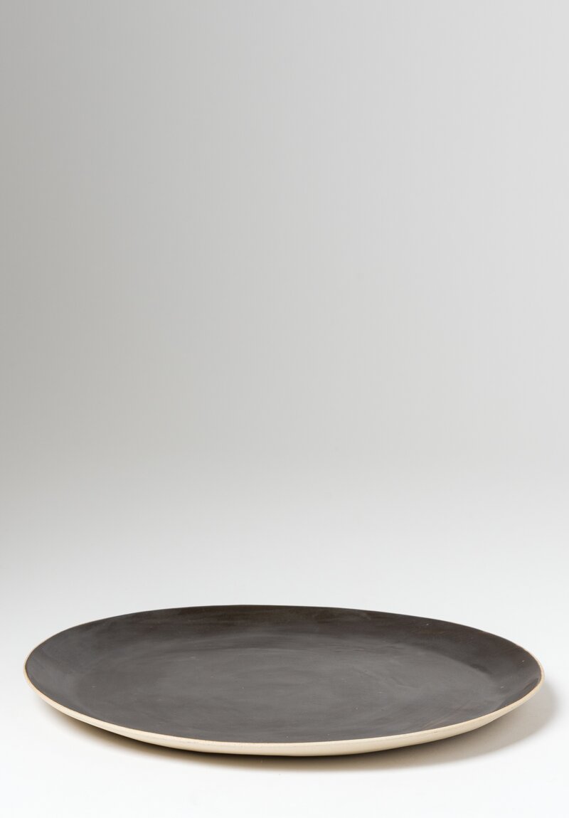 Laurie Goldstein Ceramic Dinner Plate in Black