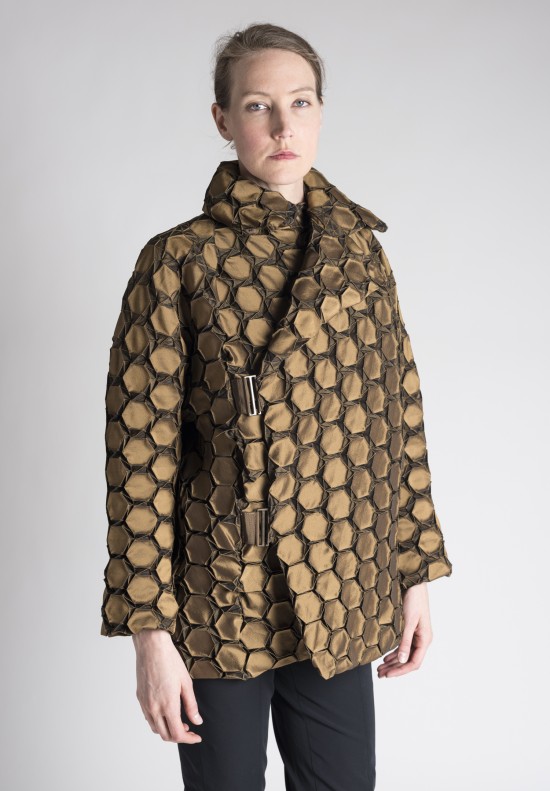  	Issey Miyake Hexagonal Pleated Jacket in Gold