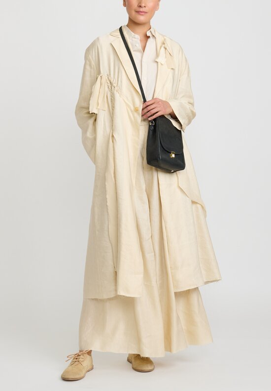 A Tentative Atelier Deconstructed Oversize Judit Twist Coat in Beige Natural	